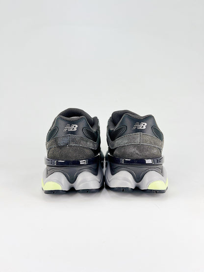 New Balance 9060 sneakers shown are in a black and cement colorway, often featuring a durable mesh and suede construction with Lime accents