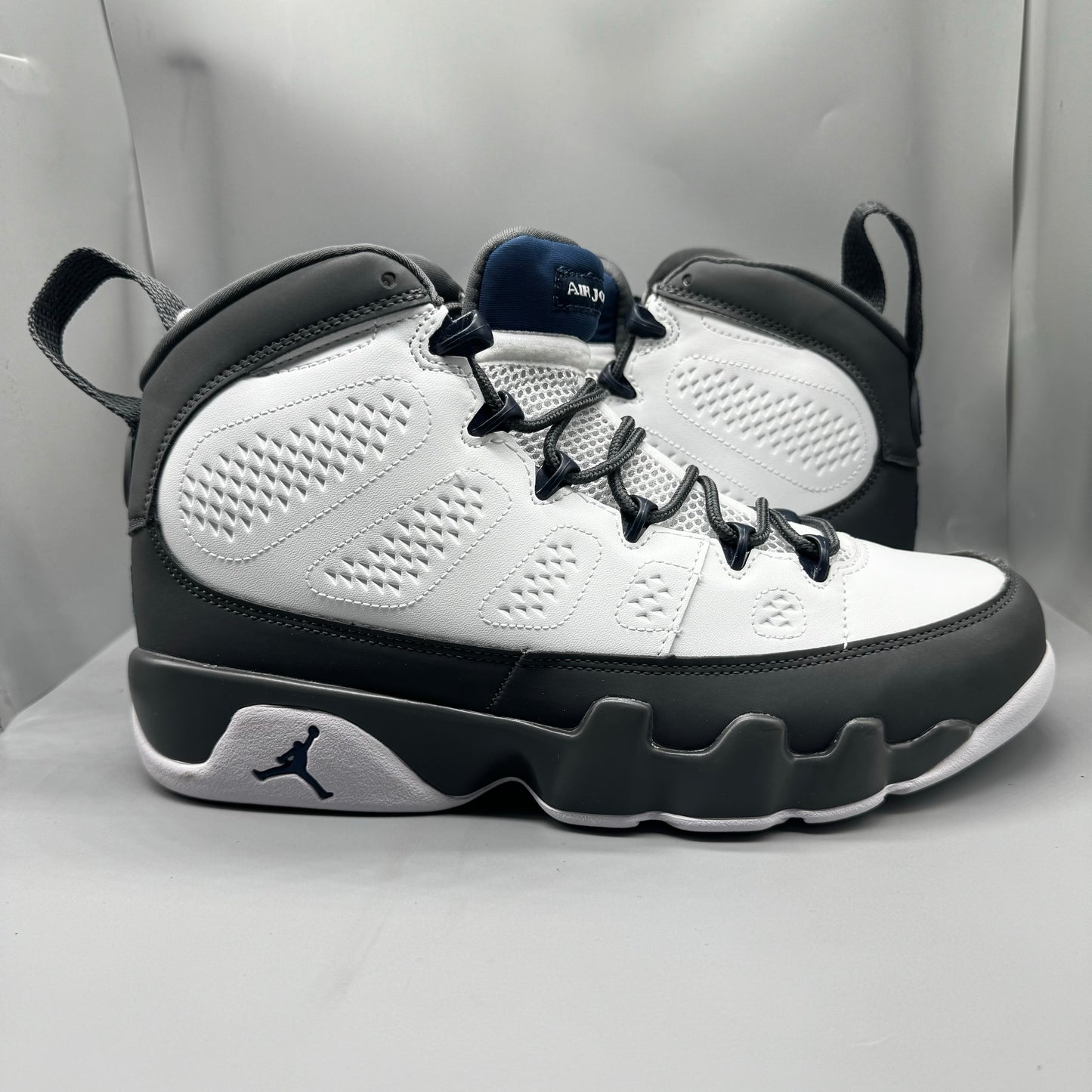 Air Jordan 9 Retro "Flint Grey" sneakers with white, French blue, and Flint grey colors